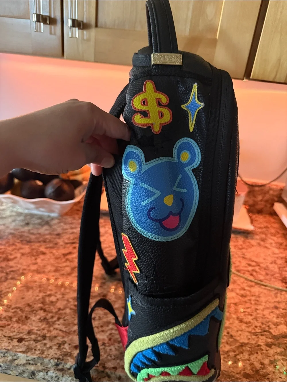Sprayground Black Backpack with Neon Green Bear Patch and Multicolor Accents
